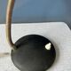 Small black metal desk lamp in Bauhaus style.