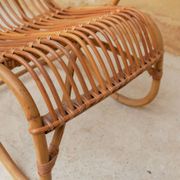 Vintage rattan chair by Louis Sognot