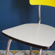 Série de 4 chaises en formica  bicolore jaune et blanc chiné