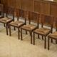 Ensemble de 6 chaises Charles Dudouyt en chêne 1950’s