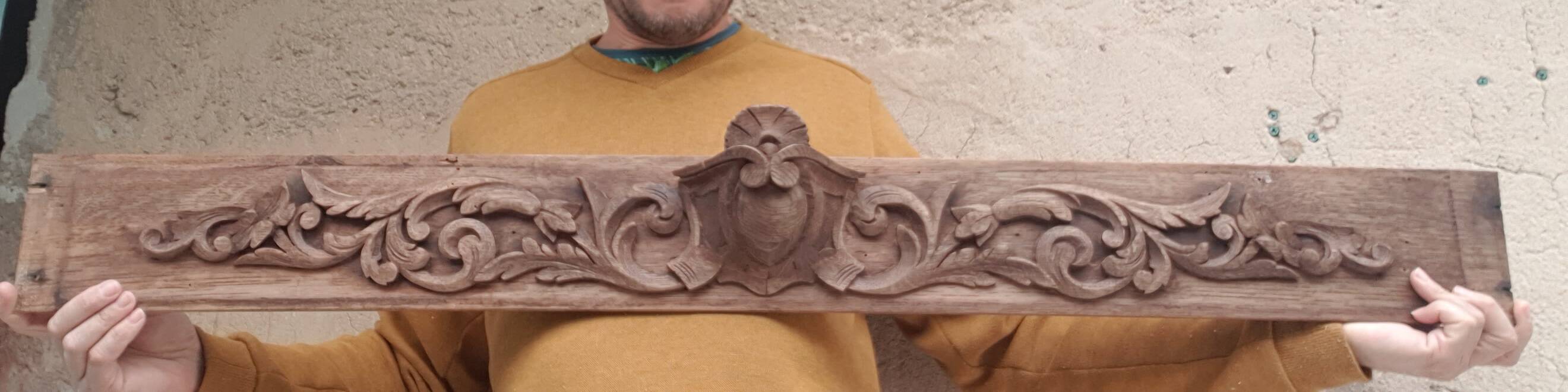 Finely carved wooden pediment