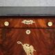 Rare four-column secretary from the Empire period in flame mahogany and bronze.