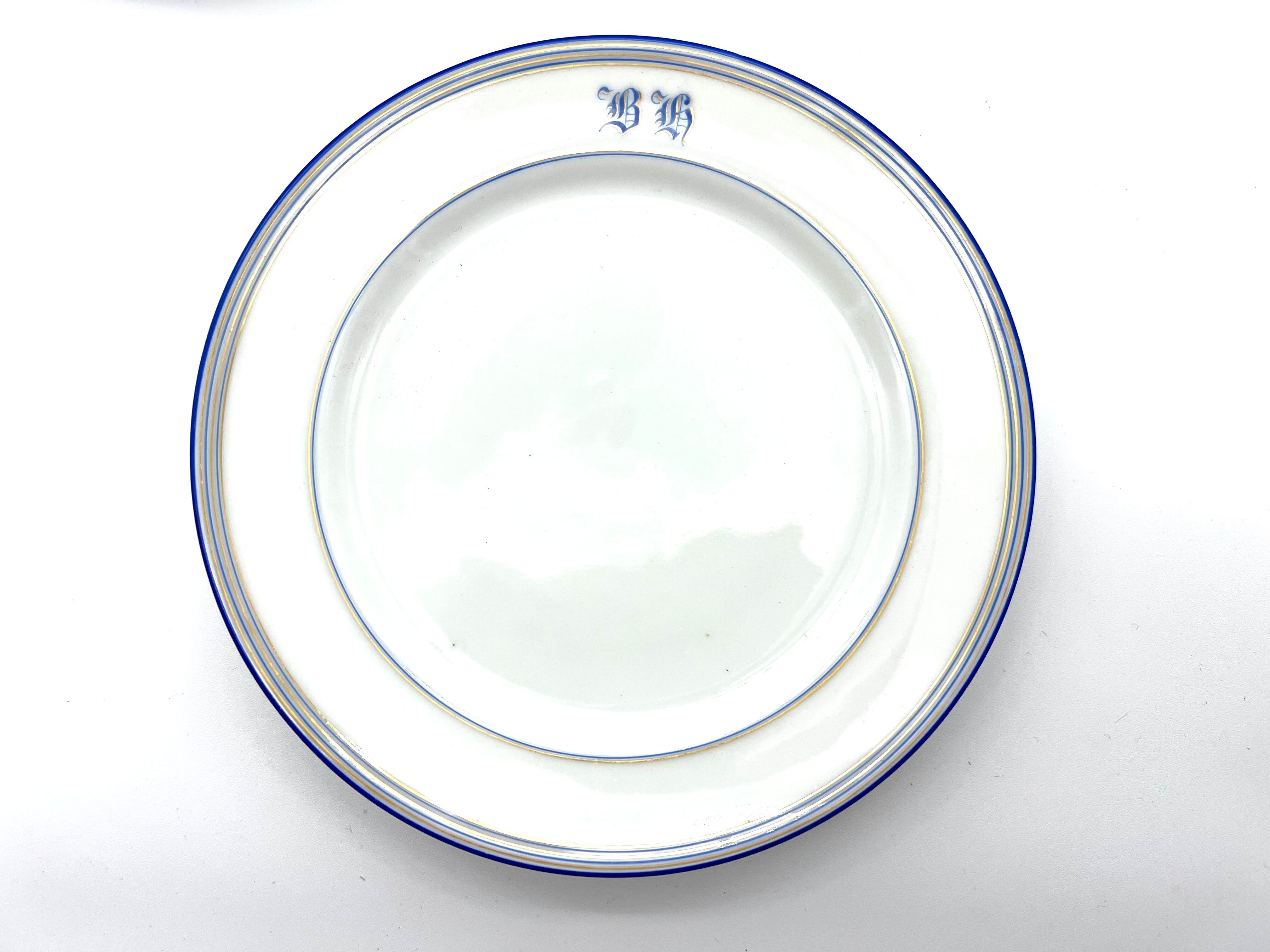 White and blue dessert plate with monogram BH