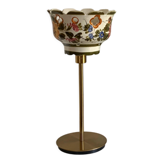 Table lamp with an old earthenware lampshade (flower patterns) and a golden base