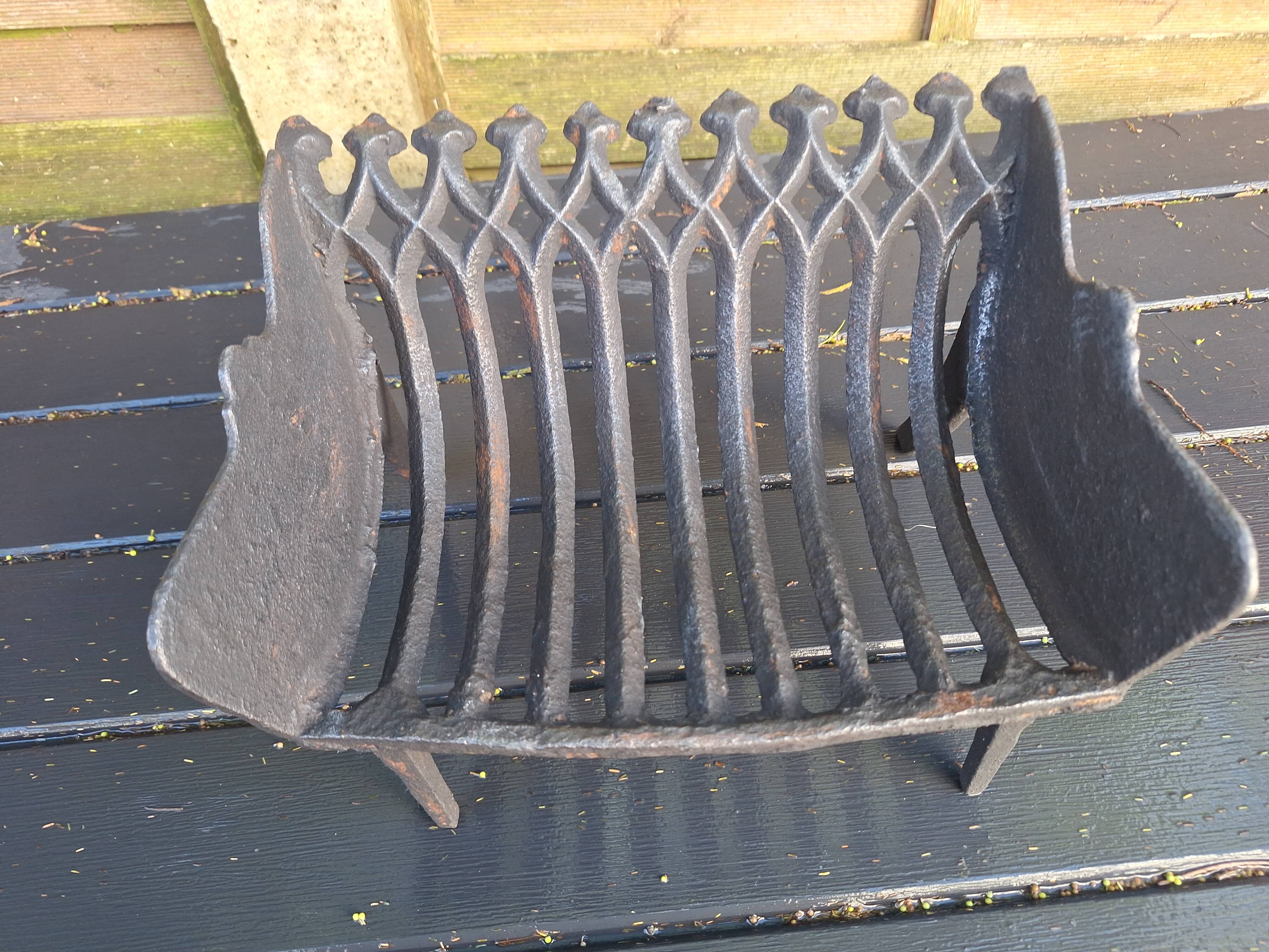 Antique cast iron log holder/ember holder for fireplace