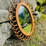 Vintage oval rattan mirror from the 60s/70s.