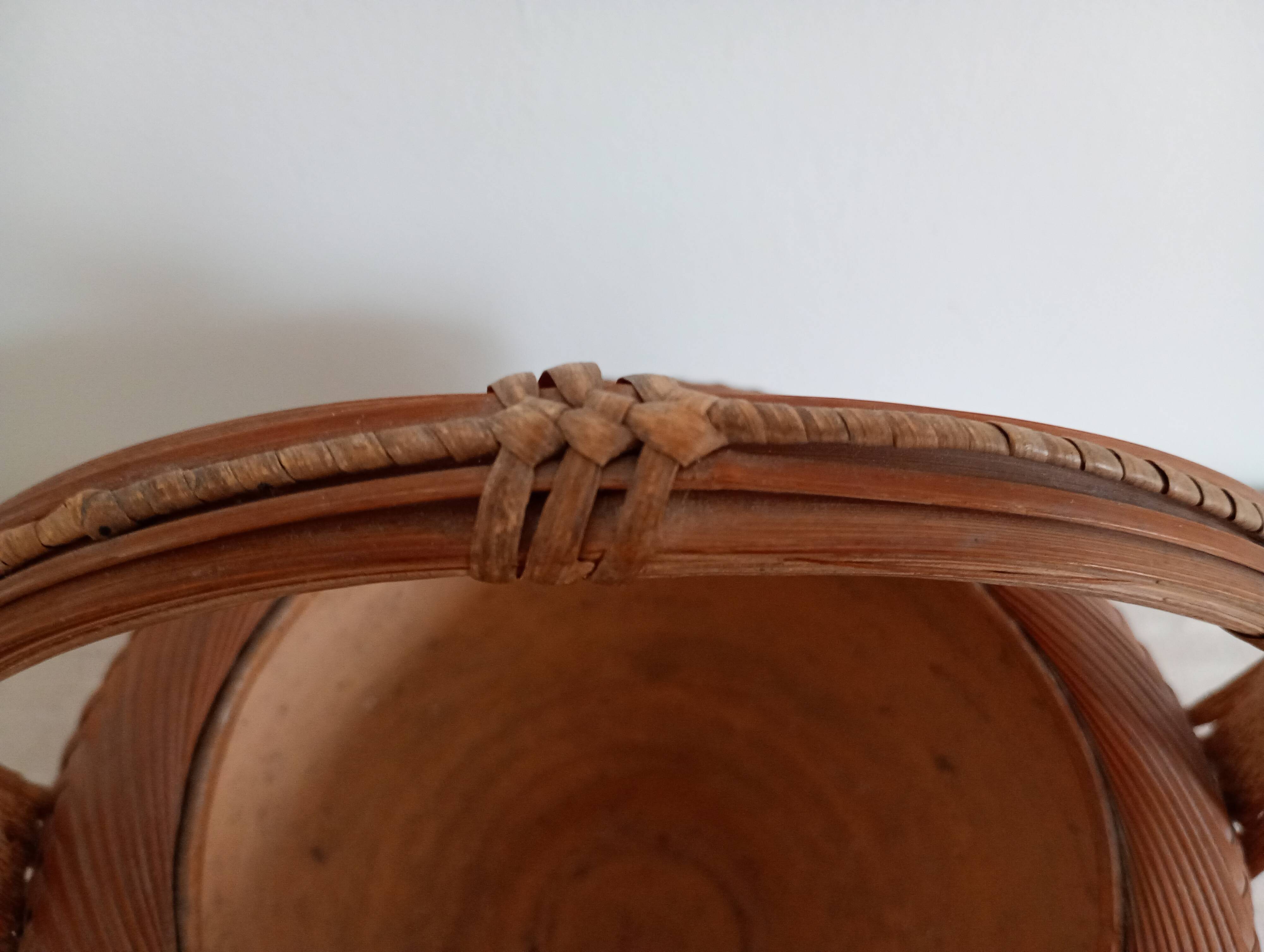 Woven bamboo basket and ceramic. Philippines.
