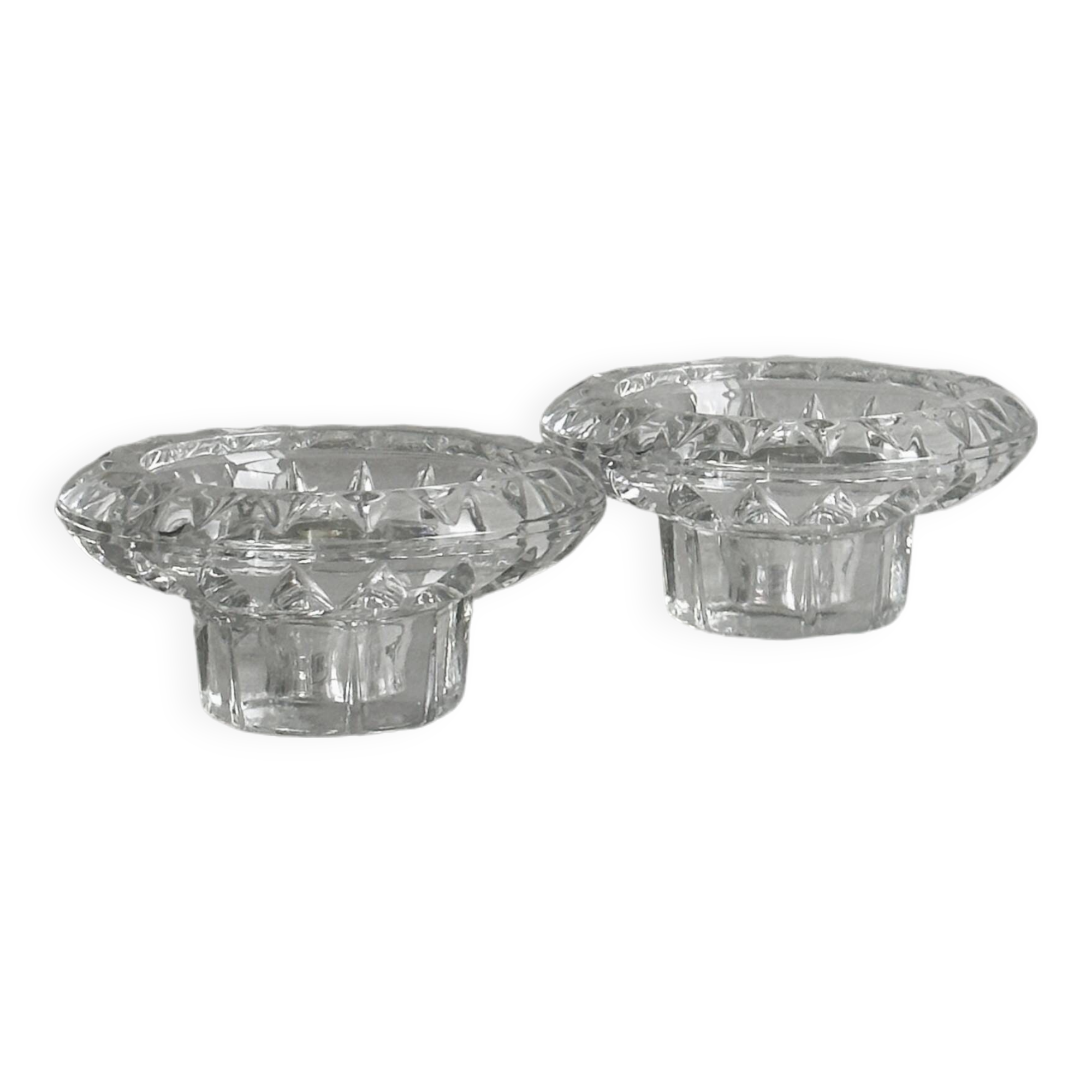 Duo of small candlesticks in chiseled glass