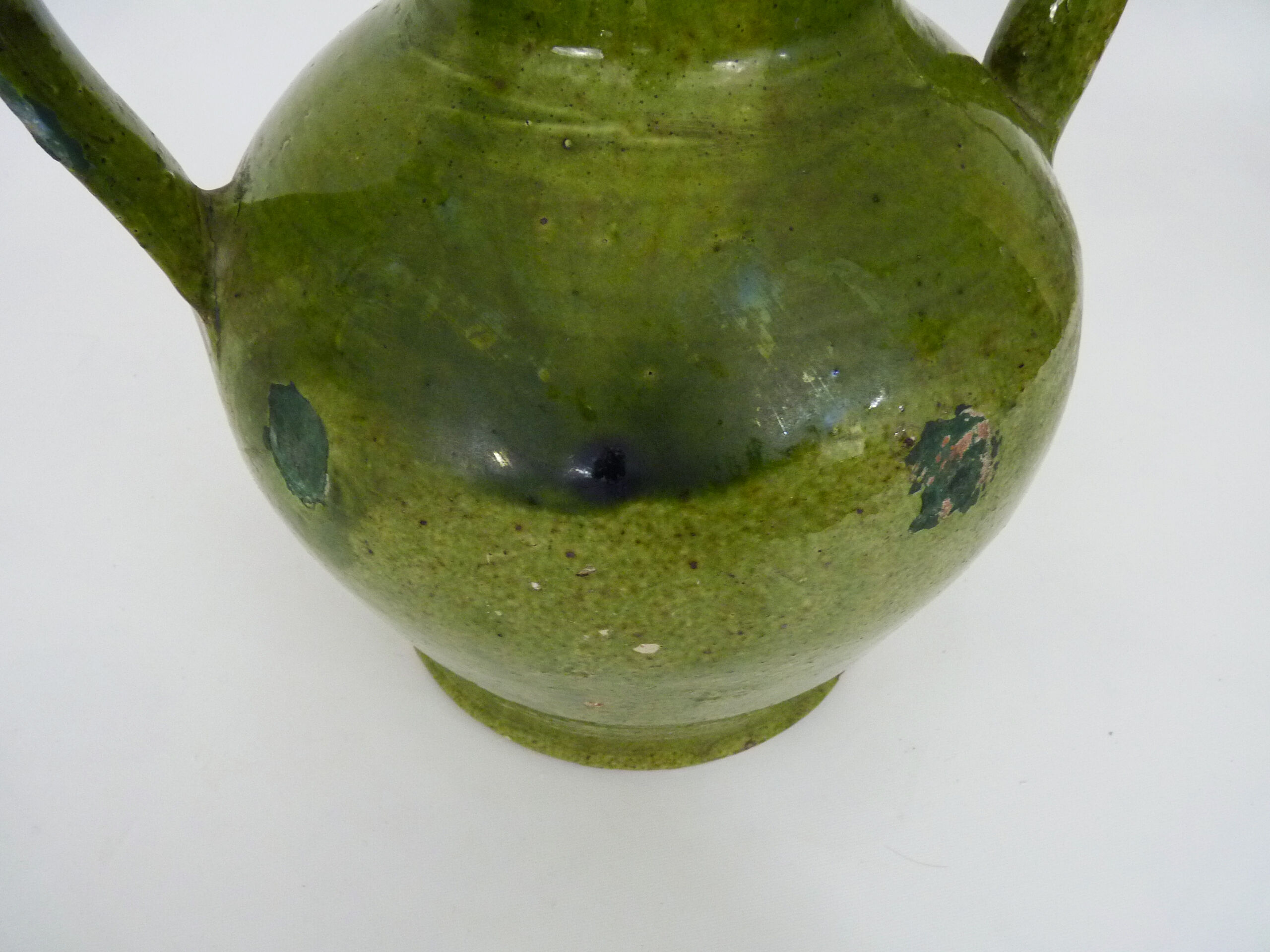 Orjol water pitcher pottery in green glazed terracotta. Pyrenees XIXth