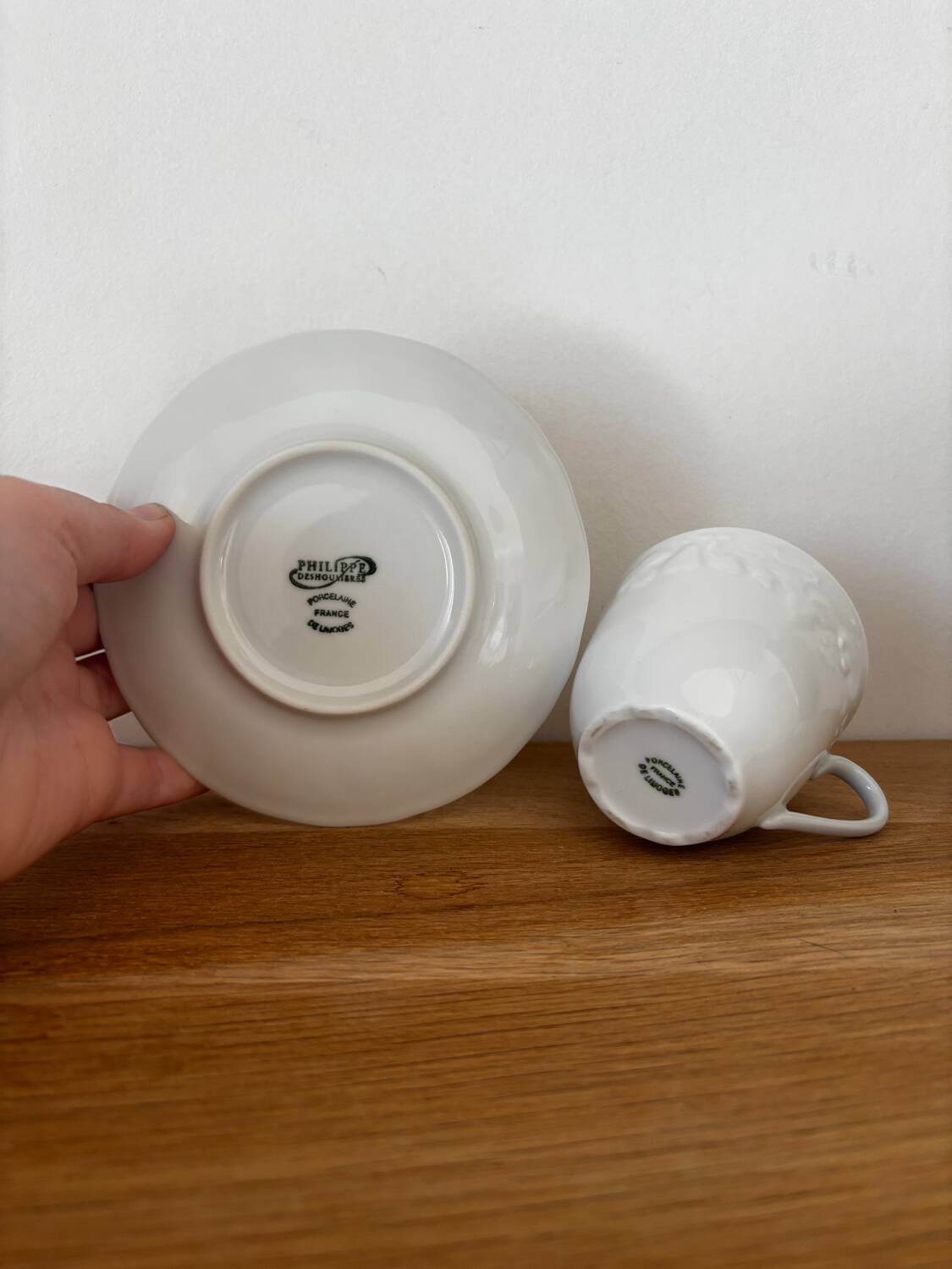 5 cups, 4 saucers and a creamer in Philippe Deshoulières porcelain