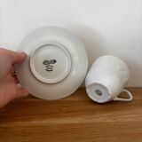 5 cups, 4 saucers and a creamer in Philippe Deshoulières porcelain
