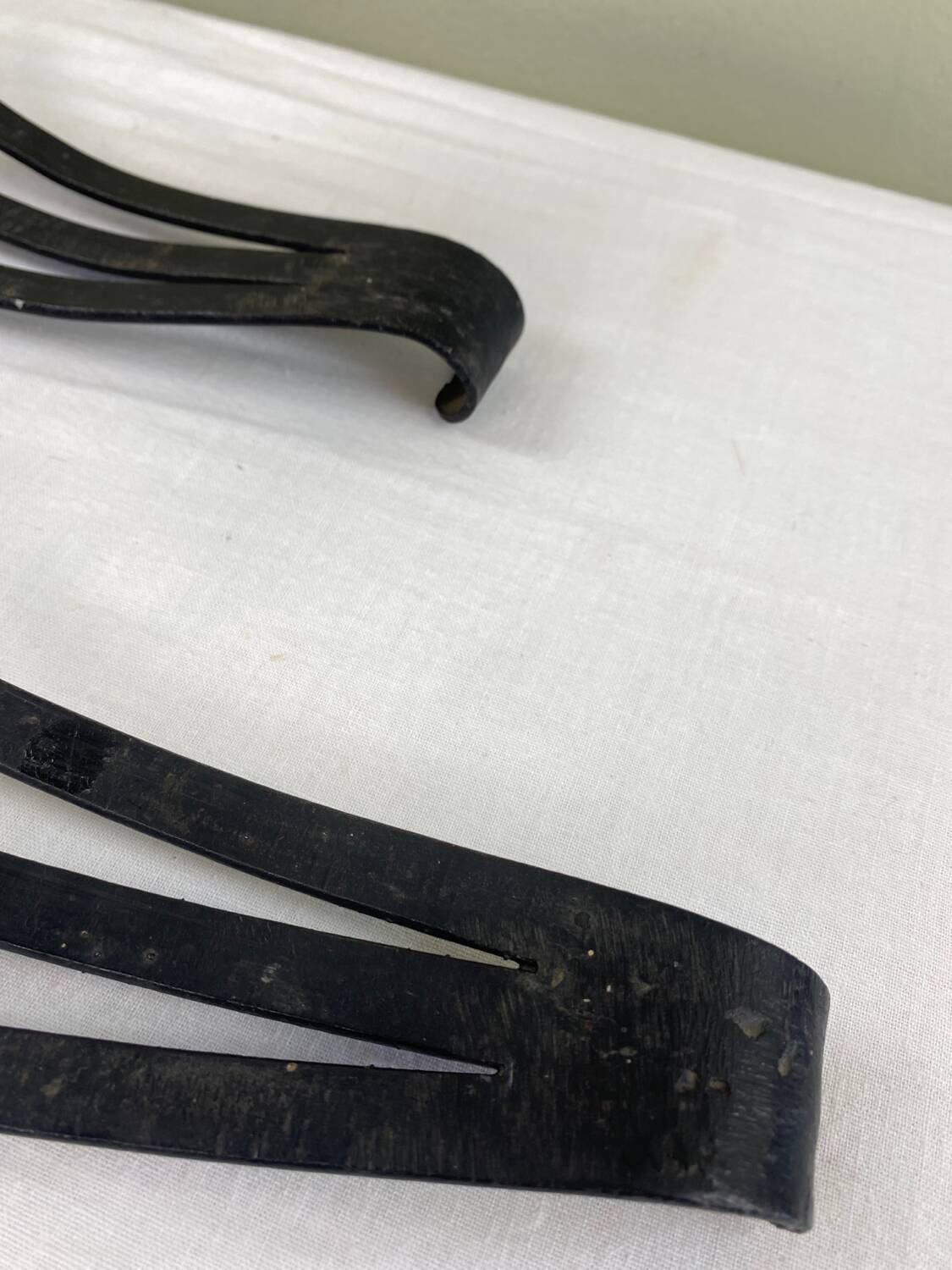 Pair of wrought iron candlesticks