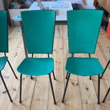 4 chaises années 60, assise et dossier vert anglais, chassis acier noir