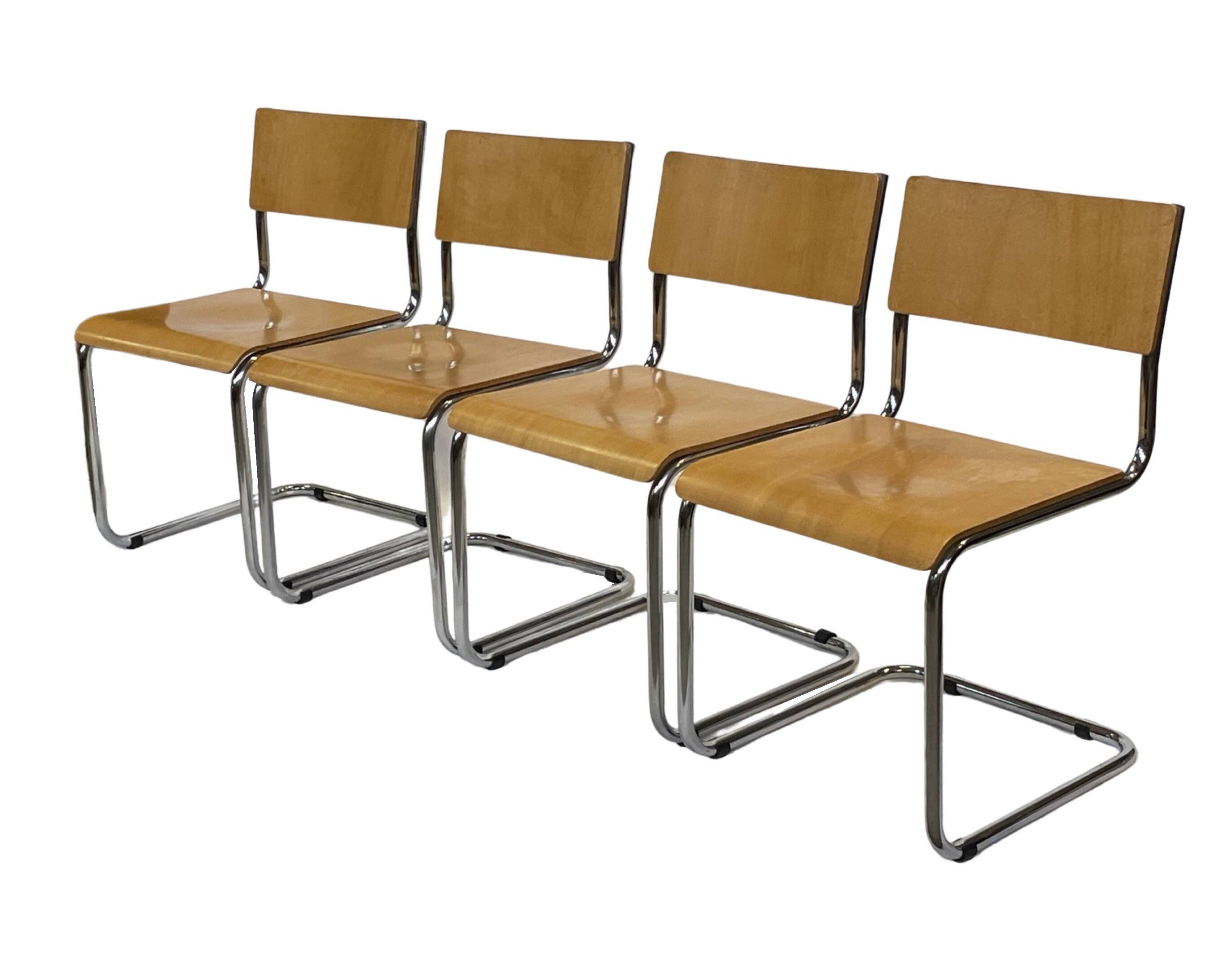 Set of four vintage dining room chairs, wood and chrome,  1970s