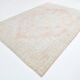 Tapis de salon persan rouge pâle