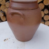 Old sandstone pot and its lid