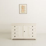 Small accent cabinet with drawers and swing doors