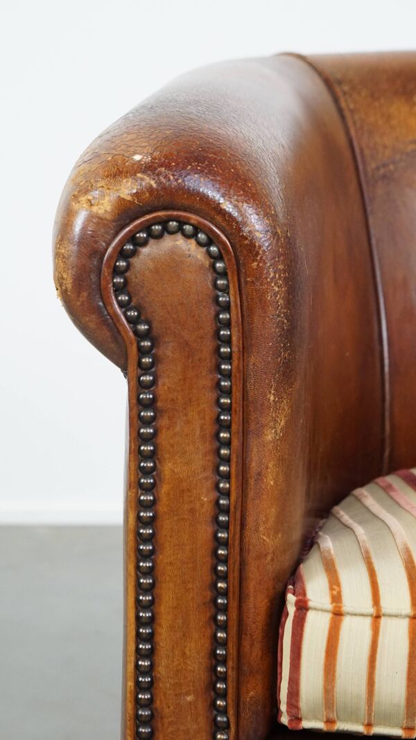 Fauteuil club vintage couleur cognac en cuir de mouton