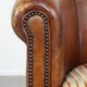 Fauteuil club vintage couleur cognac en cuir de mouton