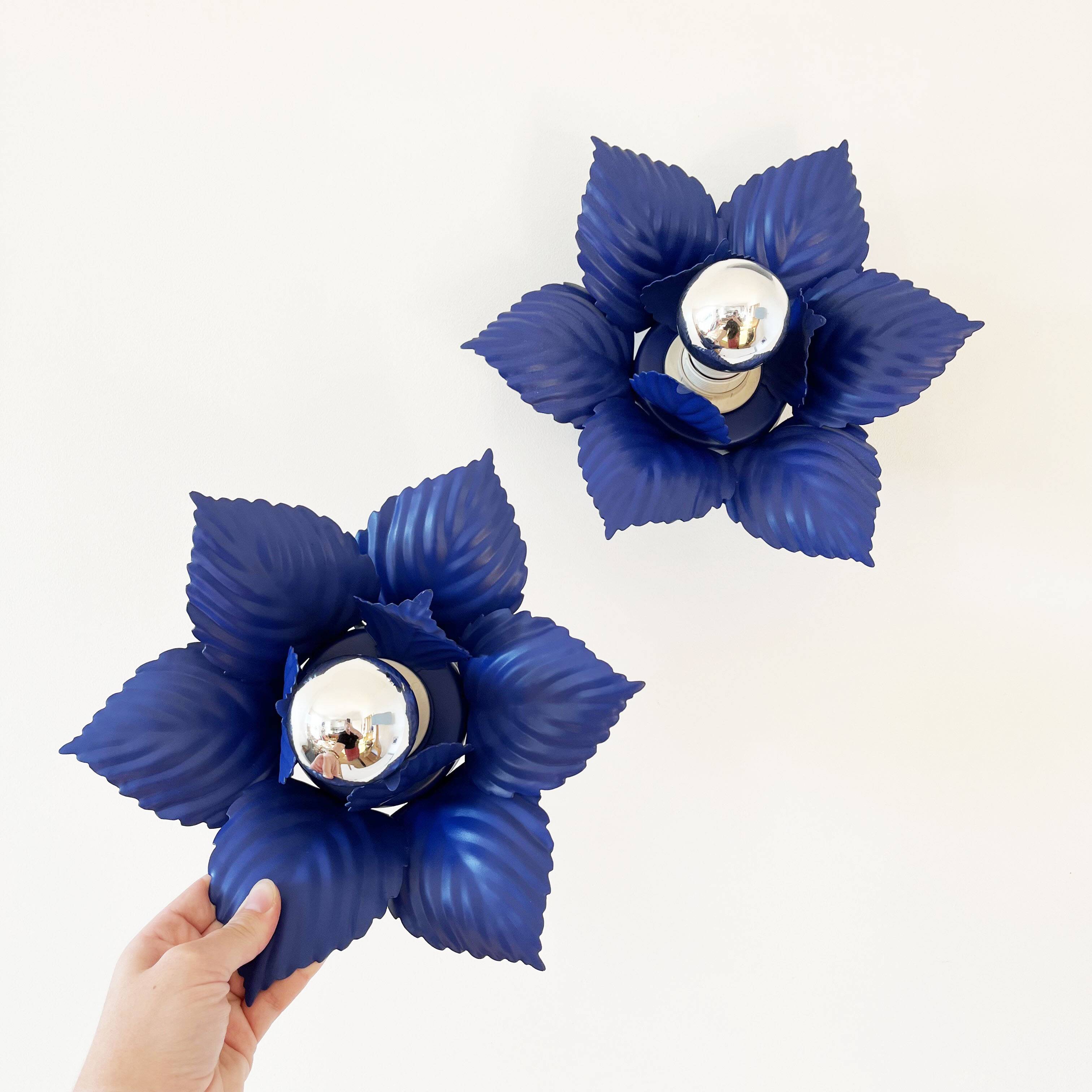 Pair of vintage Masca blue metal flower wall lights