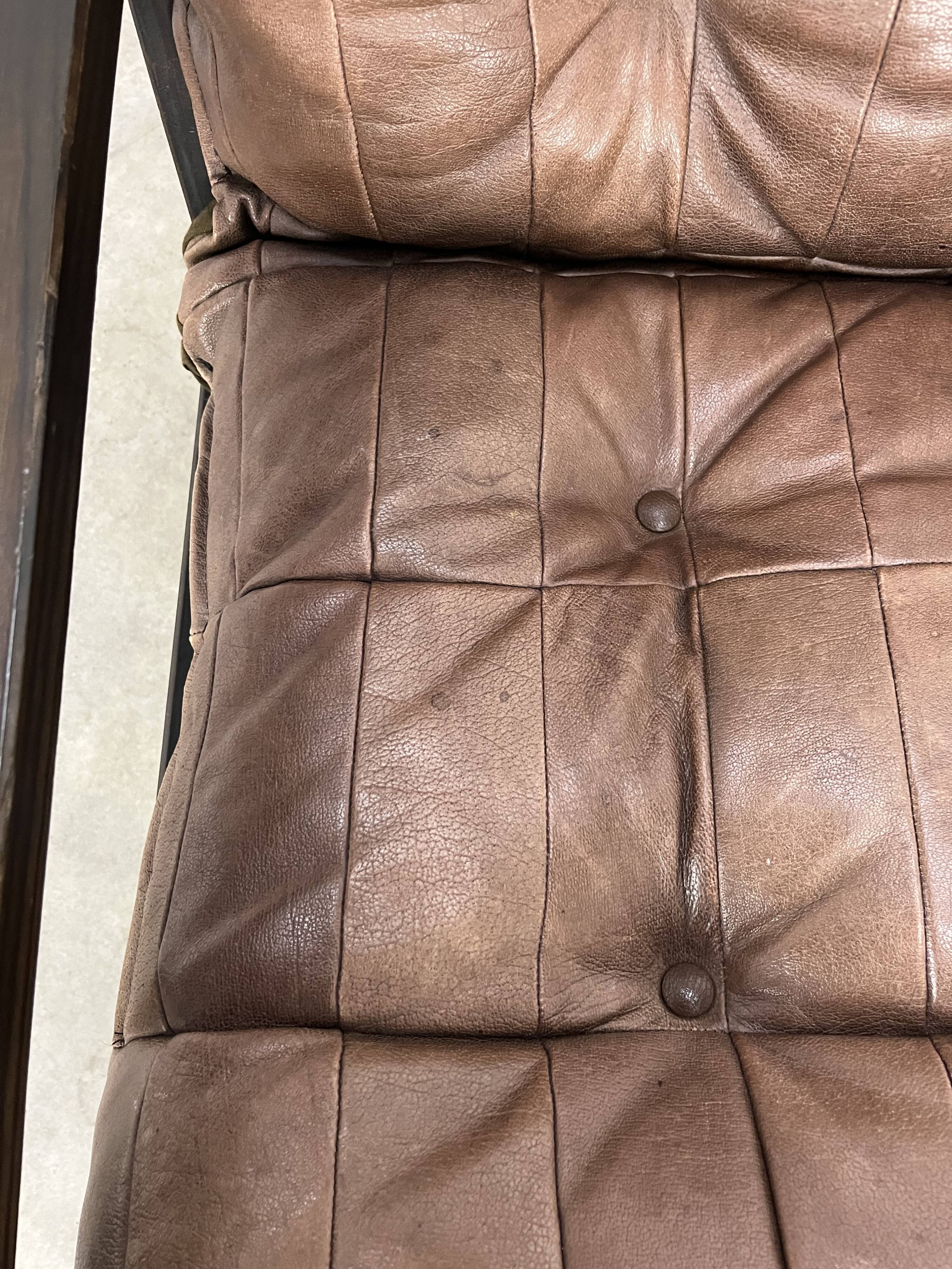 Living room sofa and brutalist armchairs in leather and wood, 70s, chalet style