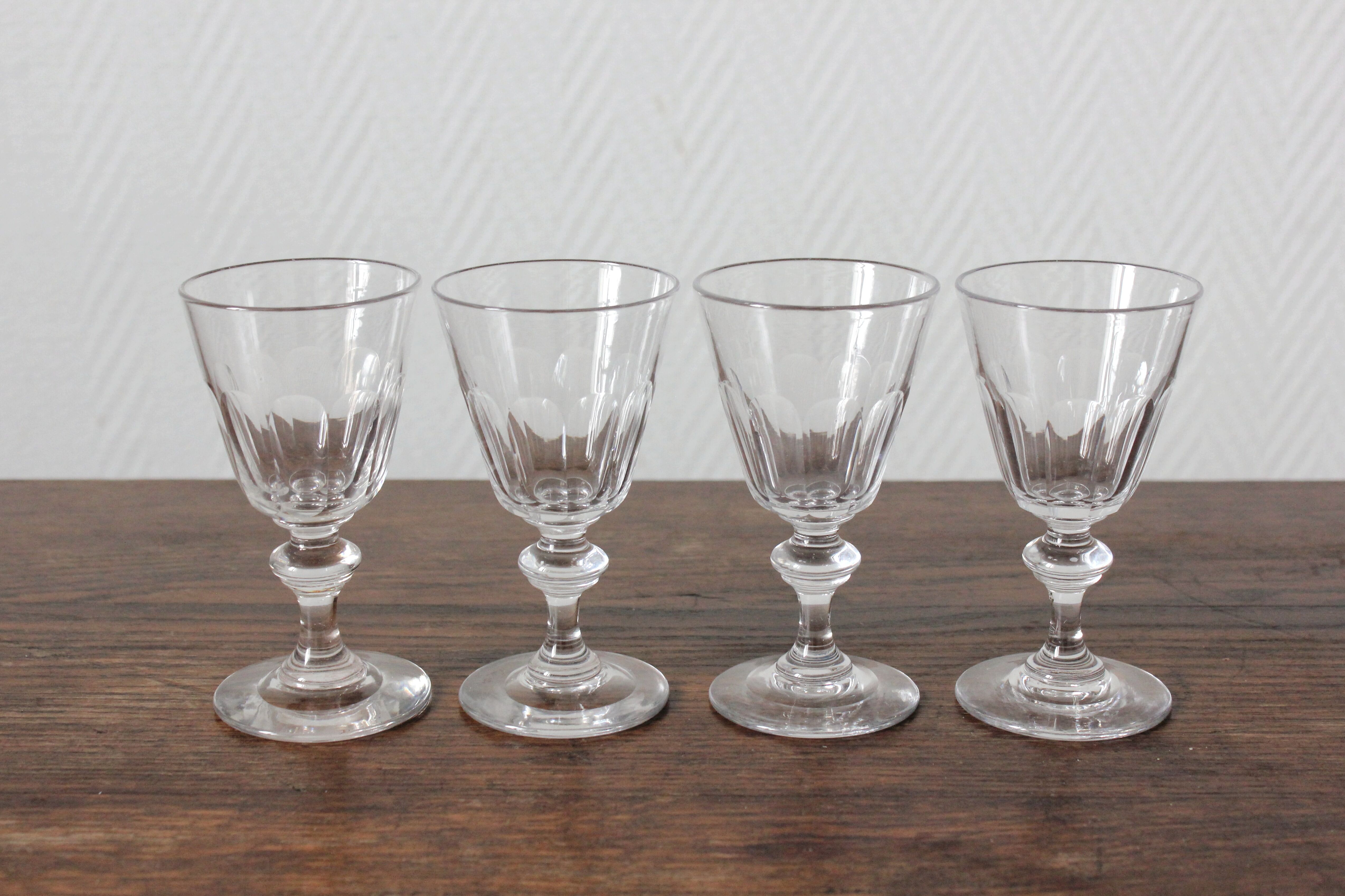 4 glasses with white wine in crystal ringing the nineteenth