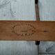Wooden coat rack with 3 metal hooks