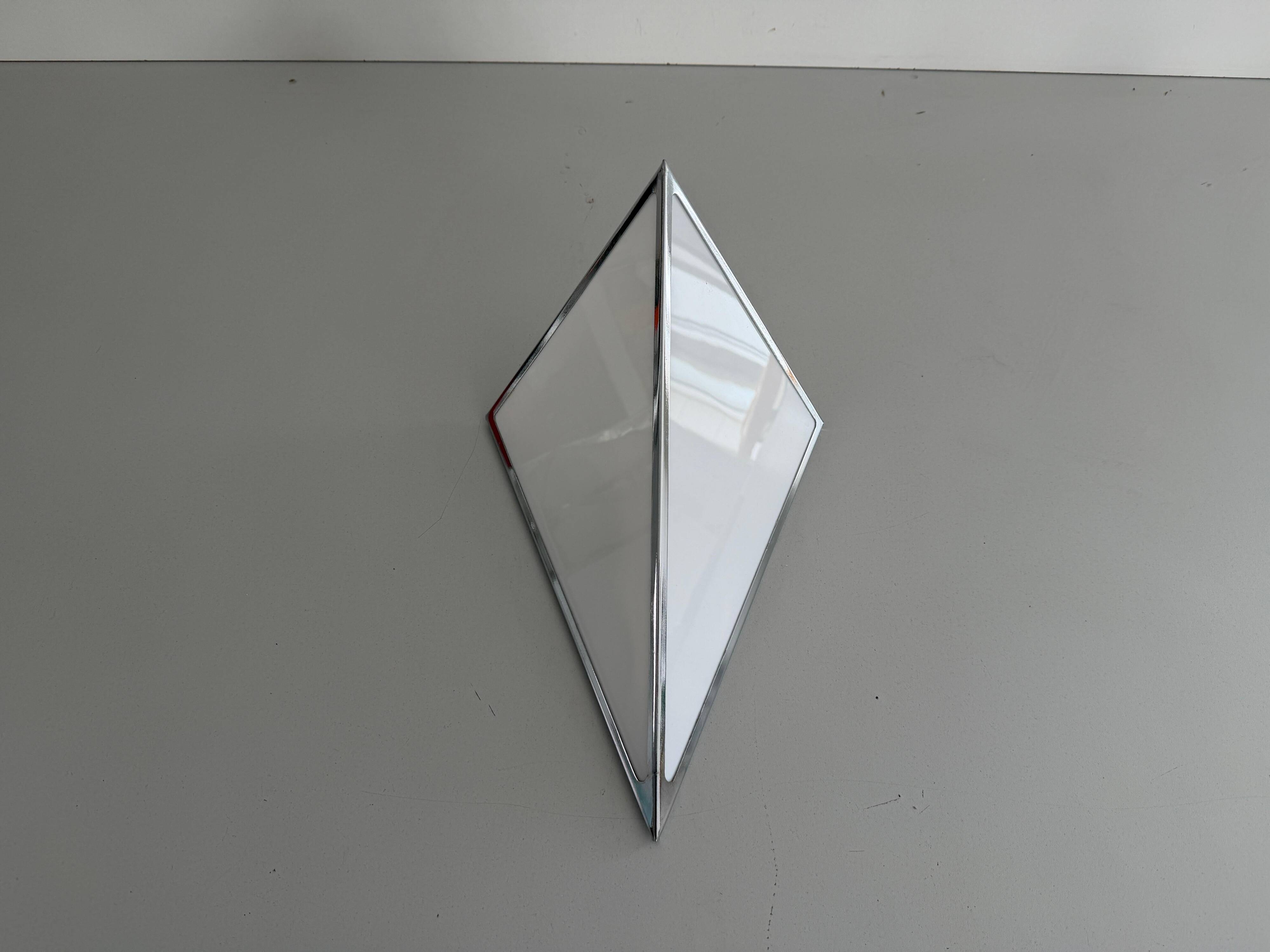Simple opal glass wall light with an aluminium body, 1980s, Germany.