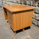 Double-sided desk with compass legs