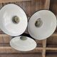 Trio of suspensions in enamelled sheet metal