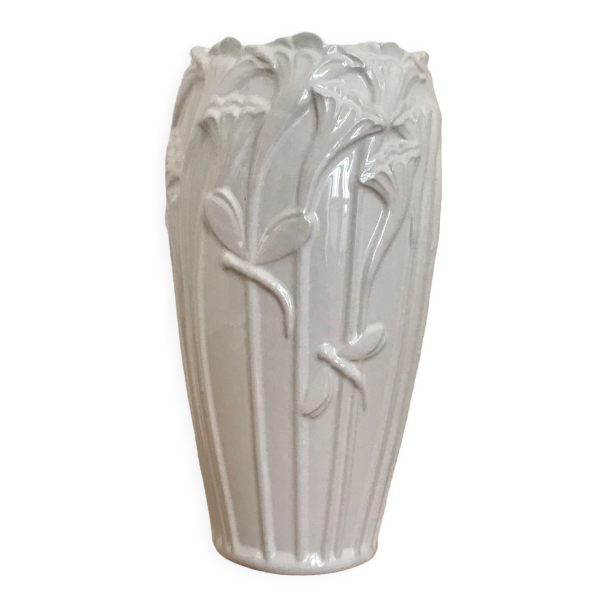 Old white art nouveau vase with flowers and dragonflies