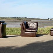 Modular sofa made up of 3 leather armchairs. Circa 1970