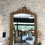Old mirror 139cm/ 91cm Louis-Philippe with pediment period early 19th, presence of gold leaf.