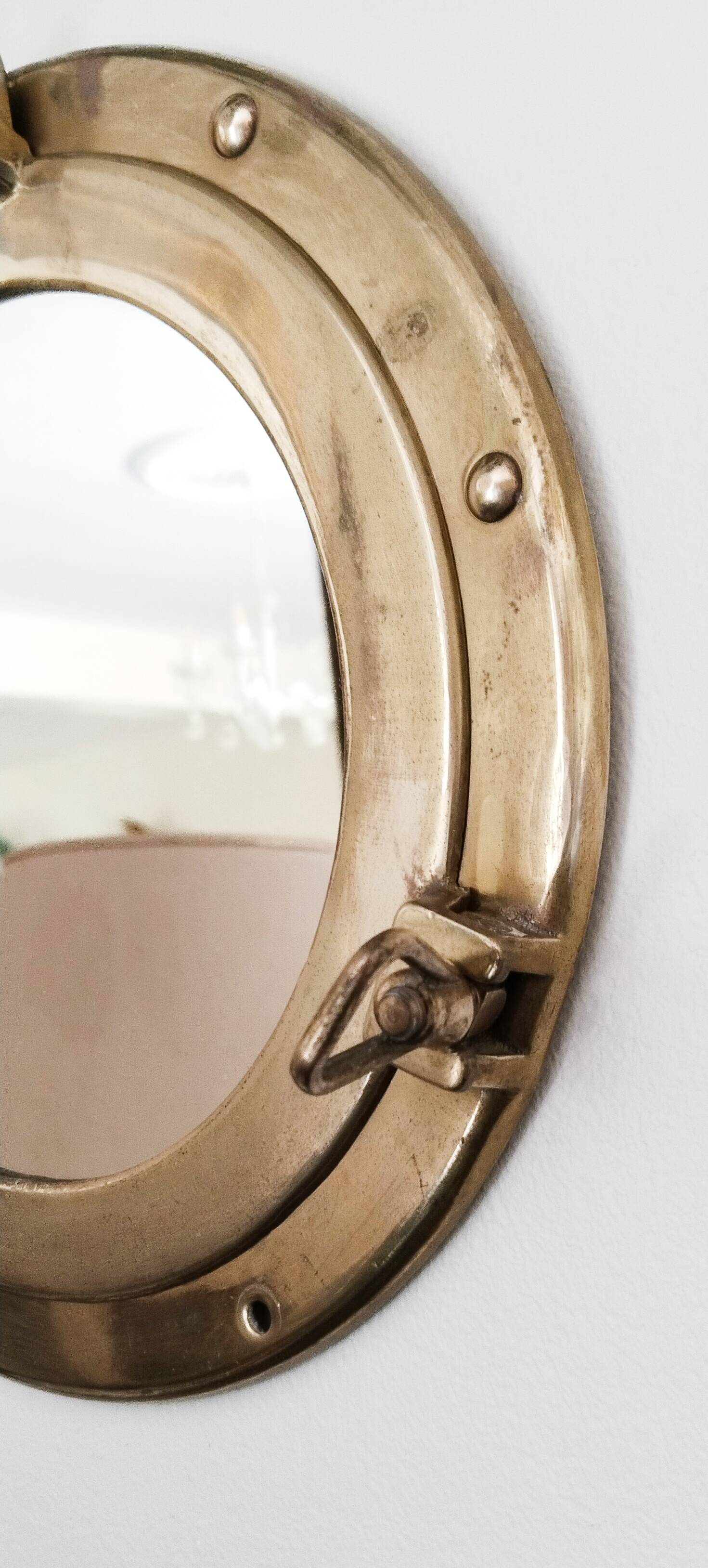 Porthole mirror in gilded brass, marine mirror
