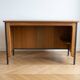 Vintage style desk by Jean Prouvé in oak and black metal.