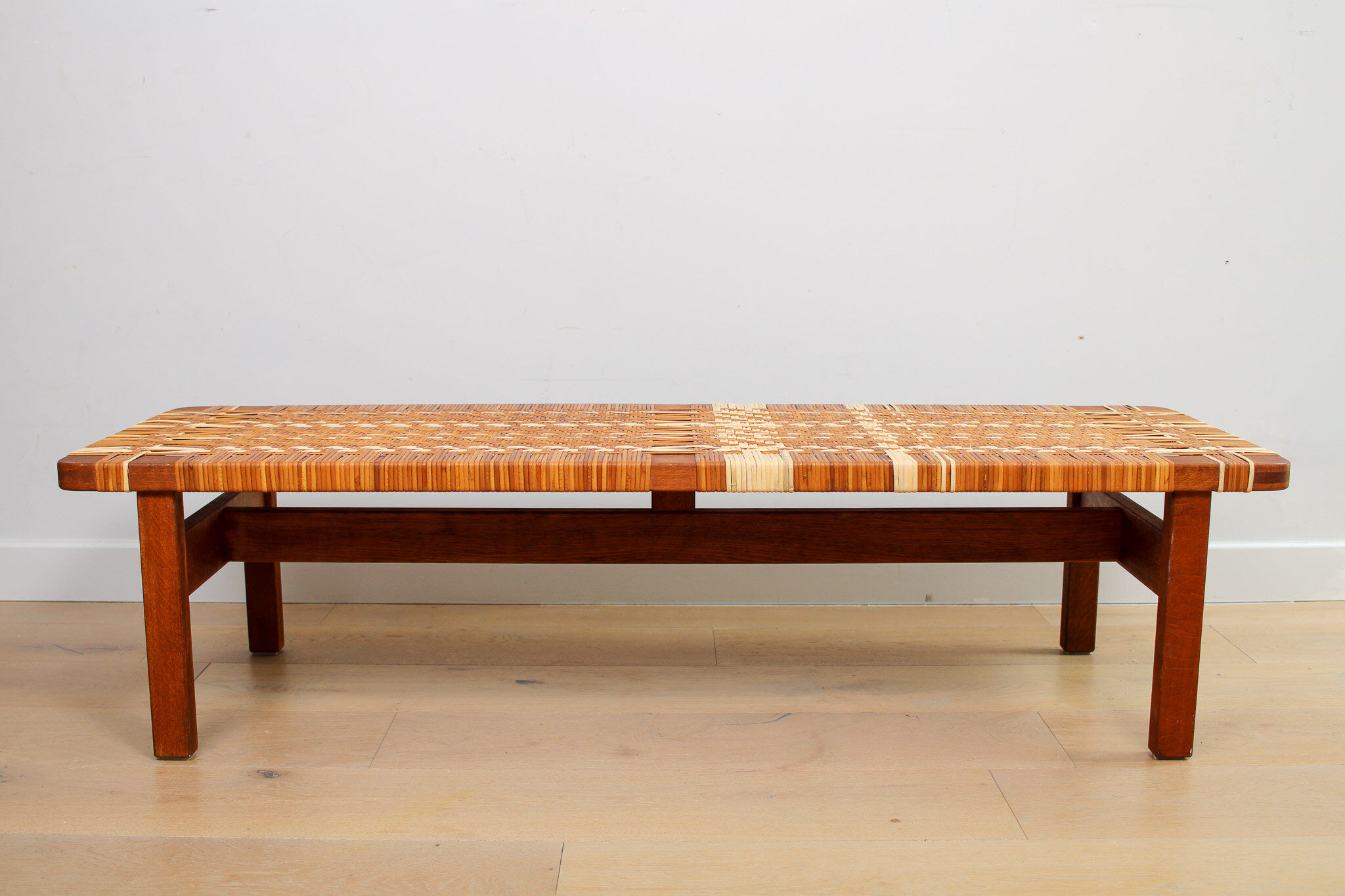 A vintage mid-century Danish Borge Mogensen 5272 rattan coffee table/bench