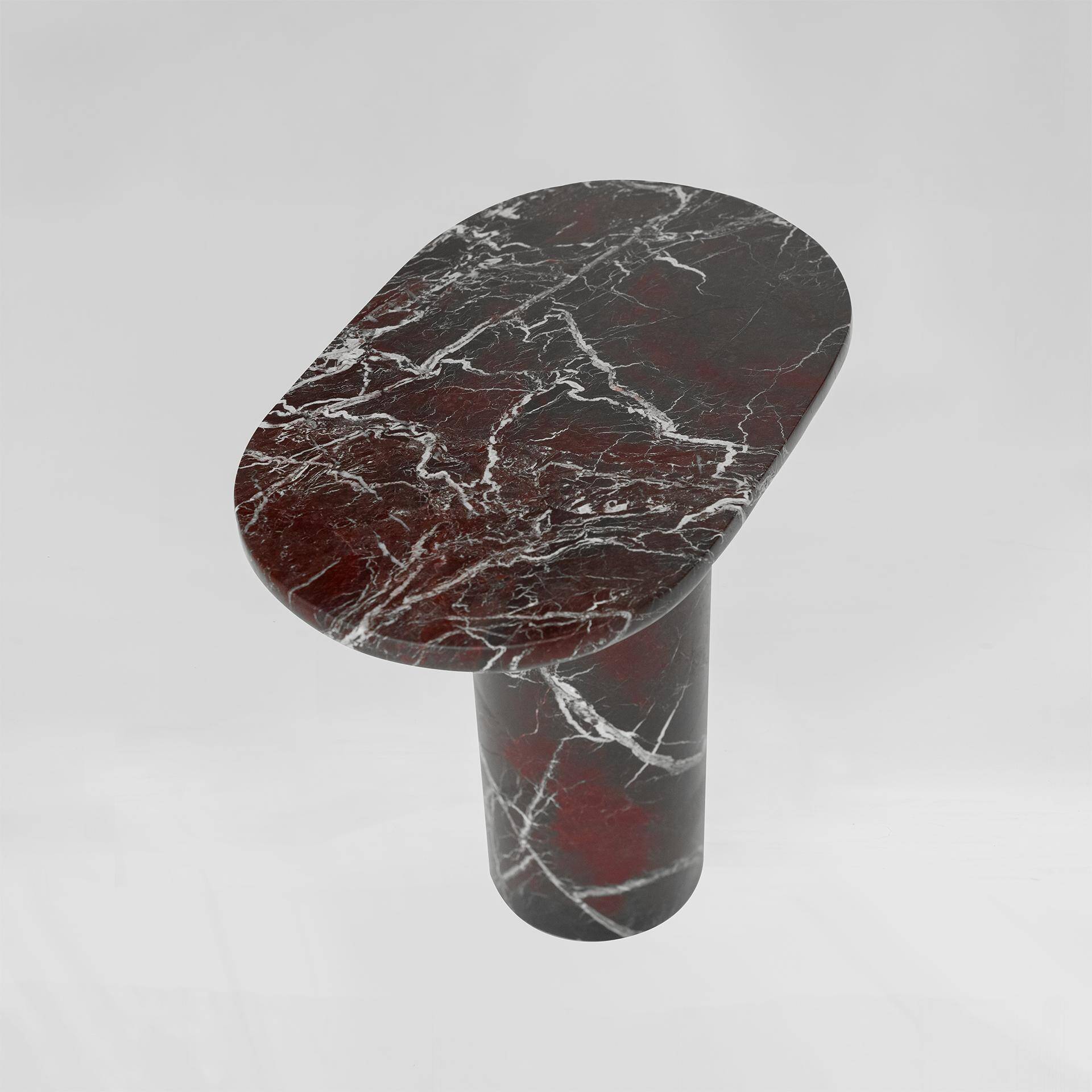 "Bold" side table in Rosso Levanto marble