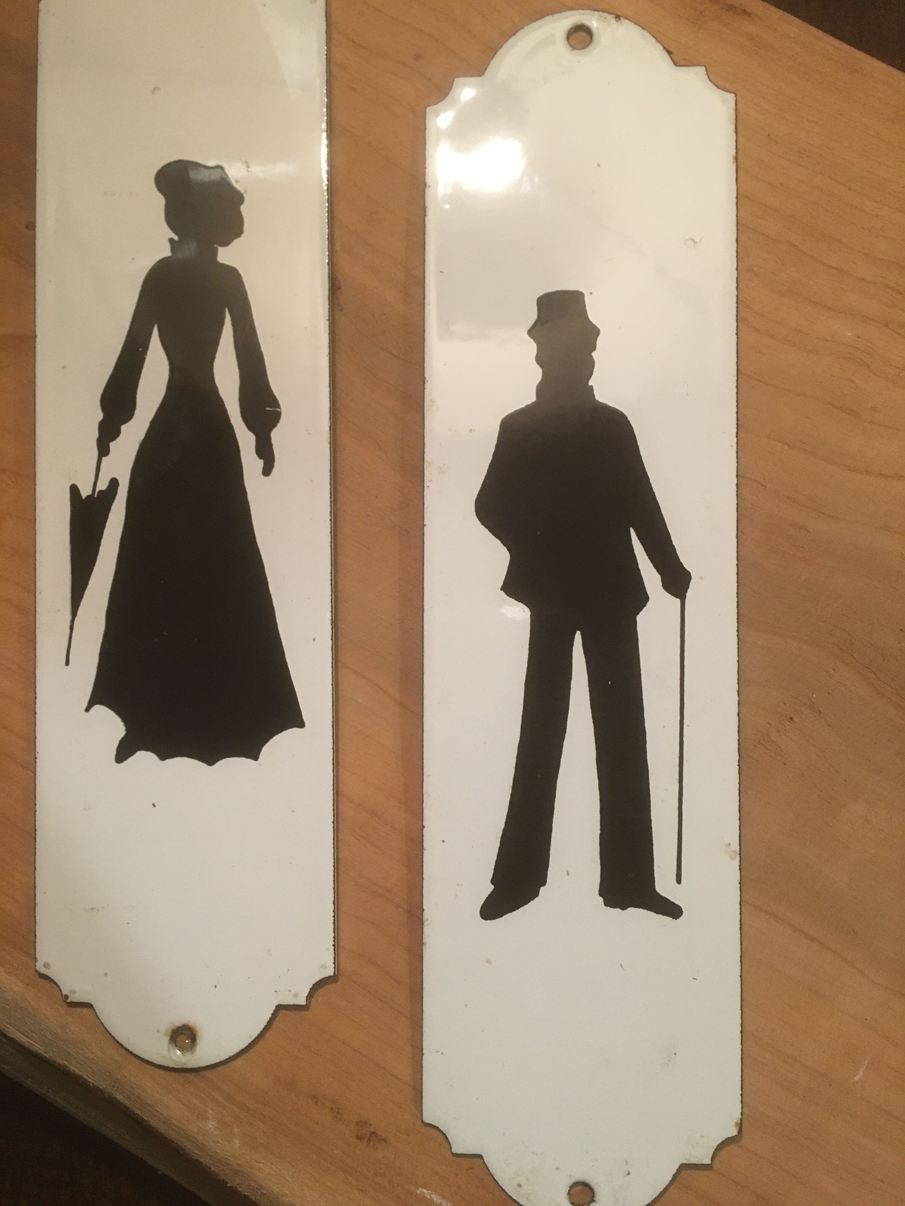 Enamelled plates men and women in clothes 1900