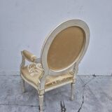Louis XVI style cabriolet armchair with decorated medallion