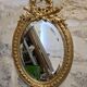 Miroir ovale doré, XIXe siècle