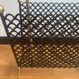 Perforated metal magazine door