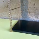 Metal thong shelf