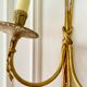 Wall light in solid brass in Empire / Neoclassical style.