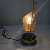 Perforated metal night light.