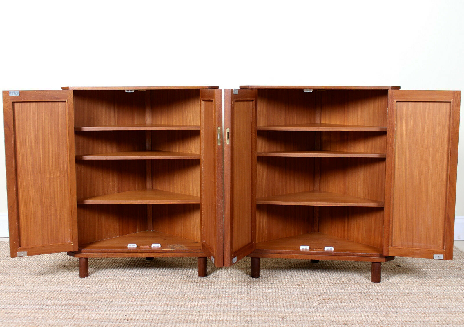 Pair of Danish teak corner cabinets dating from the mid-twentieth century