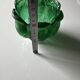 Green glass paste emptying cup from the Art Deco period