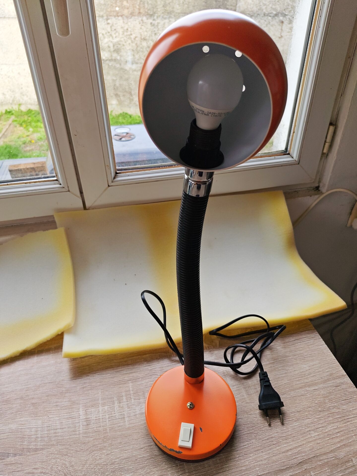 Vintage orange pop desk lamp with a flexible gooseneck - 1970s