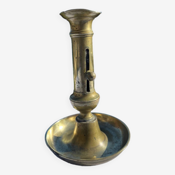 Old copper candle holder with pusher