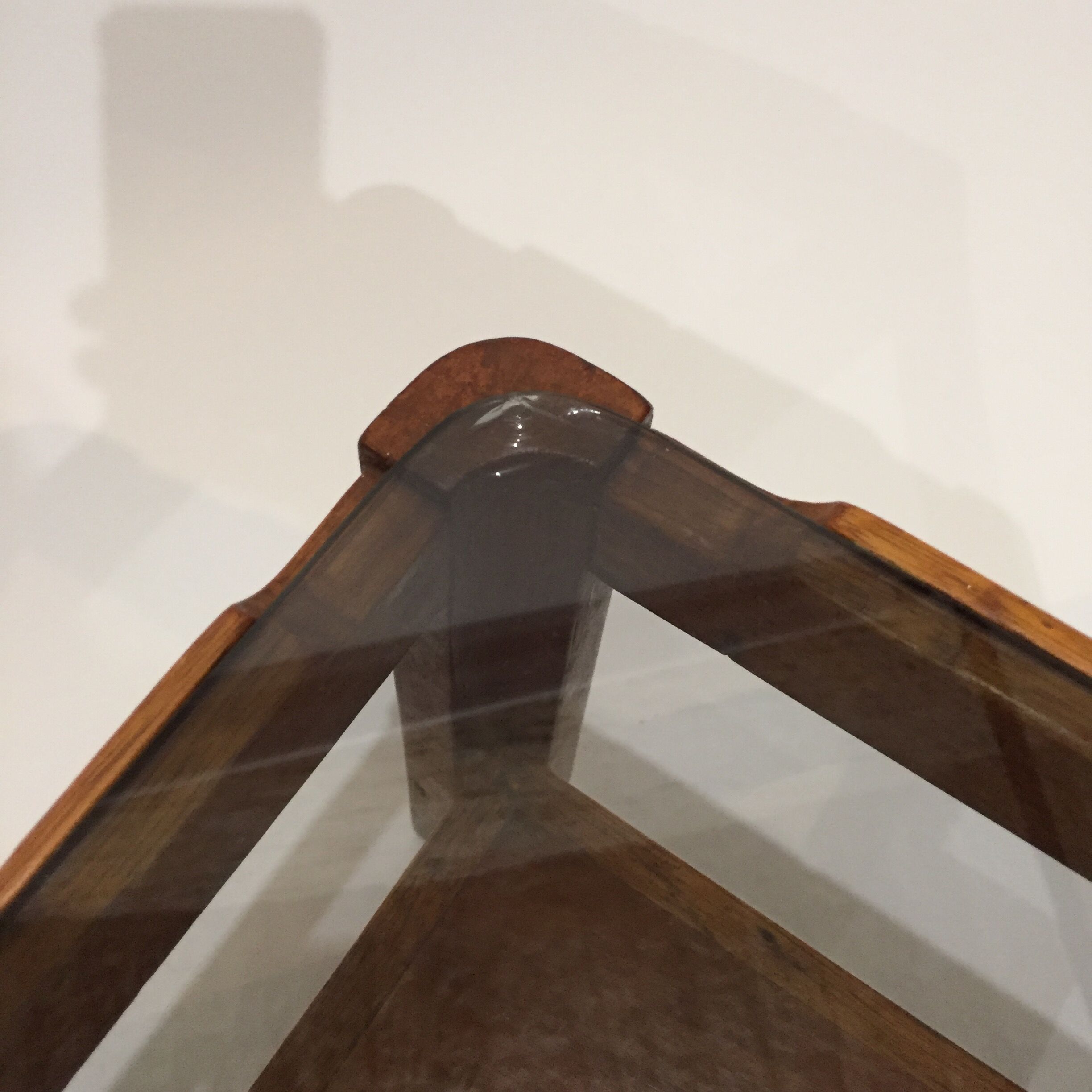 Pair of teak bedside tables and smoked glass