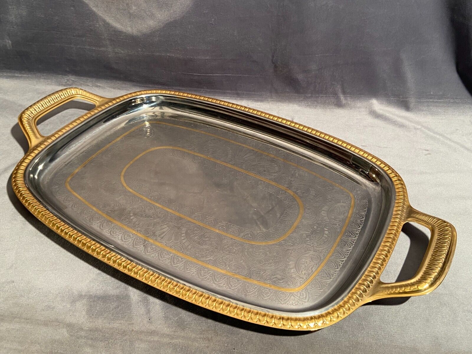 Top with stainless steel handles and gilded Regency style nets